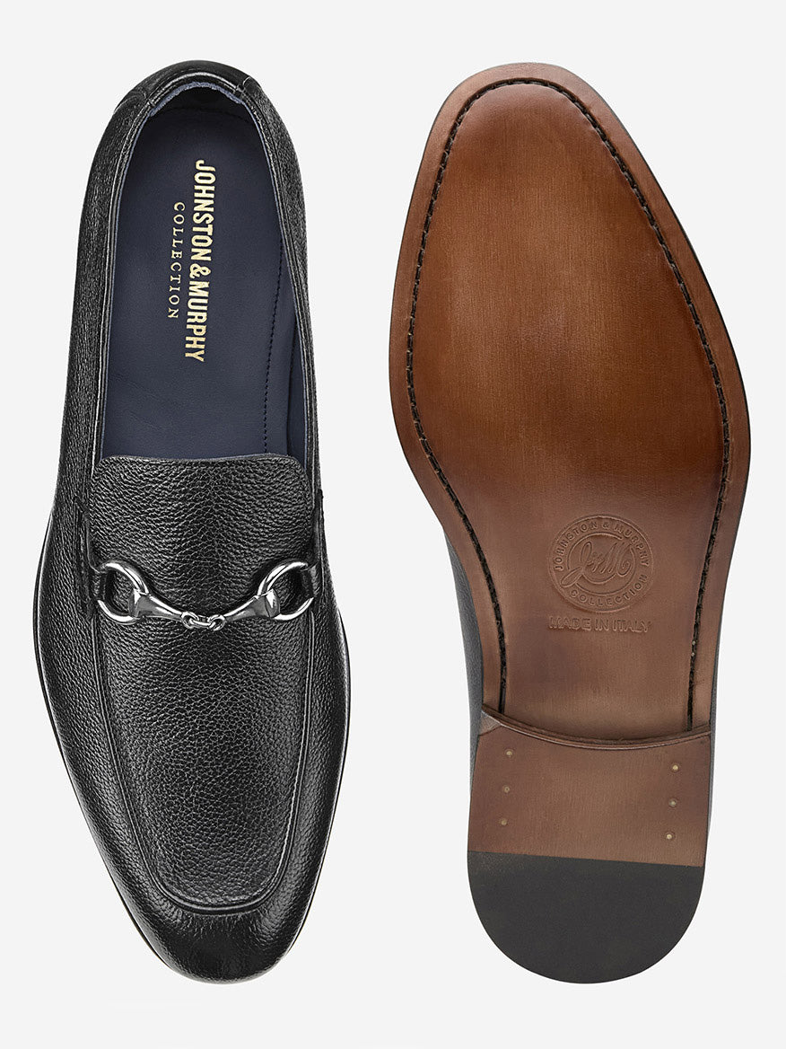The J & M Collection Taylor Bit in Black Italian Calfskin loafers feature a sleek leather upper, with one shoe shown from the top and the other displaying its classic brown sole.