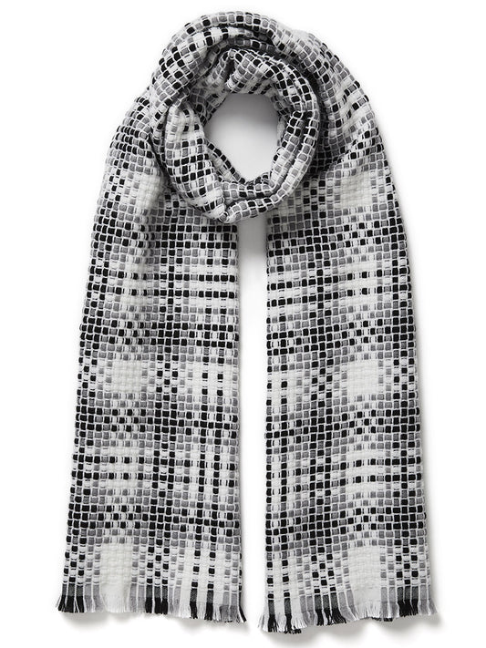 Jane Carr The Plaid Scarf in Black/White with frayed hems.