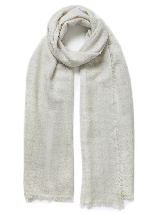 A light-colored, plain Jane Carr The Tile Scarf in White with fringed edges on a white background.