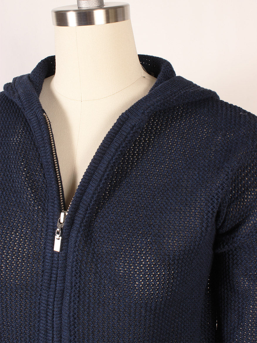 The Kinross Mesh Zip Hoodie in Navy, featuring a knit mesh design with ribbed placket and trim, is displayed on a dress form against a plain background.