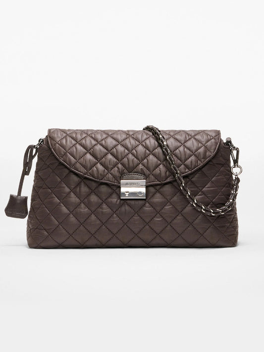 The MZ Wallace Crosby Lock Shoulder in Espresso Oxford is a quilted dark brown handbag with a flap closure, metal clasp, and chain crossbody strap, shown against a plain white background.