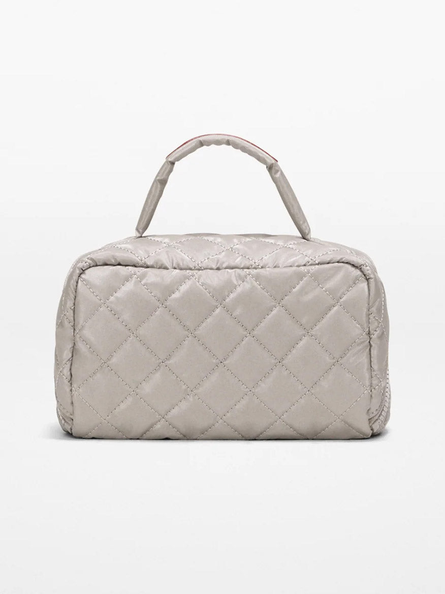 The MZ Wallace Metro Accordion Cosmetic II in Sable Pearl Metallic Oxford, a rectangular quilted bag with a top handle, is shown against a plain white background.