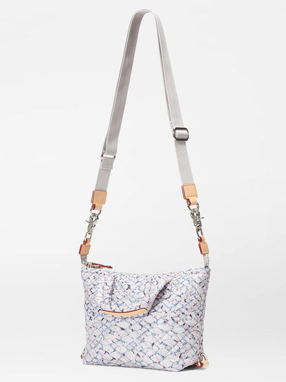 A MZ Wallace Micro Sutton in Summer Shale Oxford with a mosaic pattern and an adjustable crossbody strap displayed against a white background.