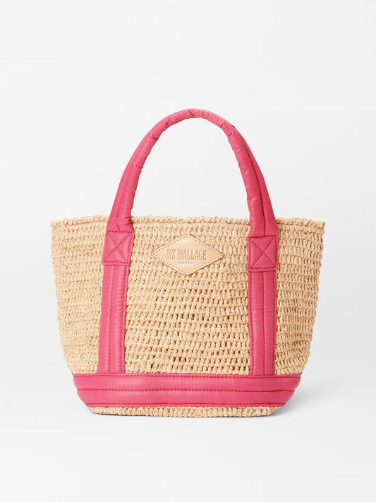 A MZ Wallace Mini Raffia tote bag in Raffia/Zinnia with vibrant pink padded nylon handles and trim, featuring a logo plaque on the front.