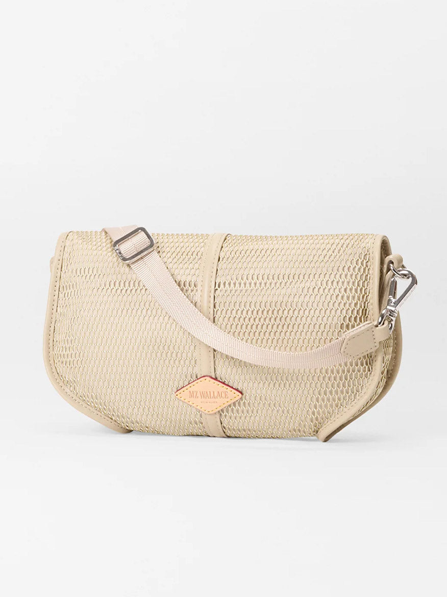 The MZ Wallace Small Astor Convertible Clutch in Buff Mesh features mesh fabrication, an adjustable strap, and a small orange "MZ WALLACE" logo tag on the front.