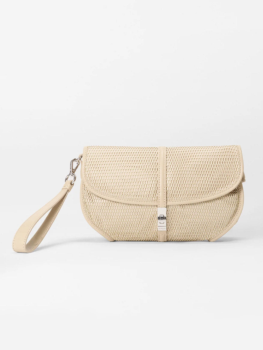 The MZ Wallace Small Astor Convertible Clutch in Buff Mesh features a beige textured finish, fold-over flap, metal clasp, Italian leather trim, and a detachable wrist strap, shown against a plain white background.
