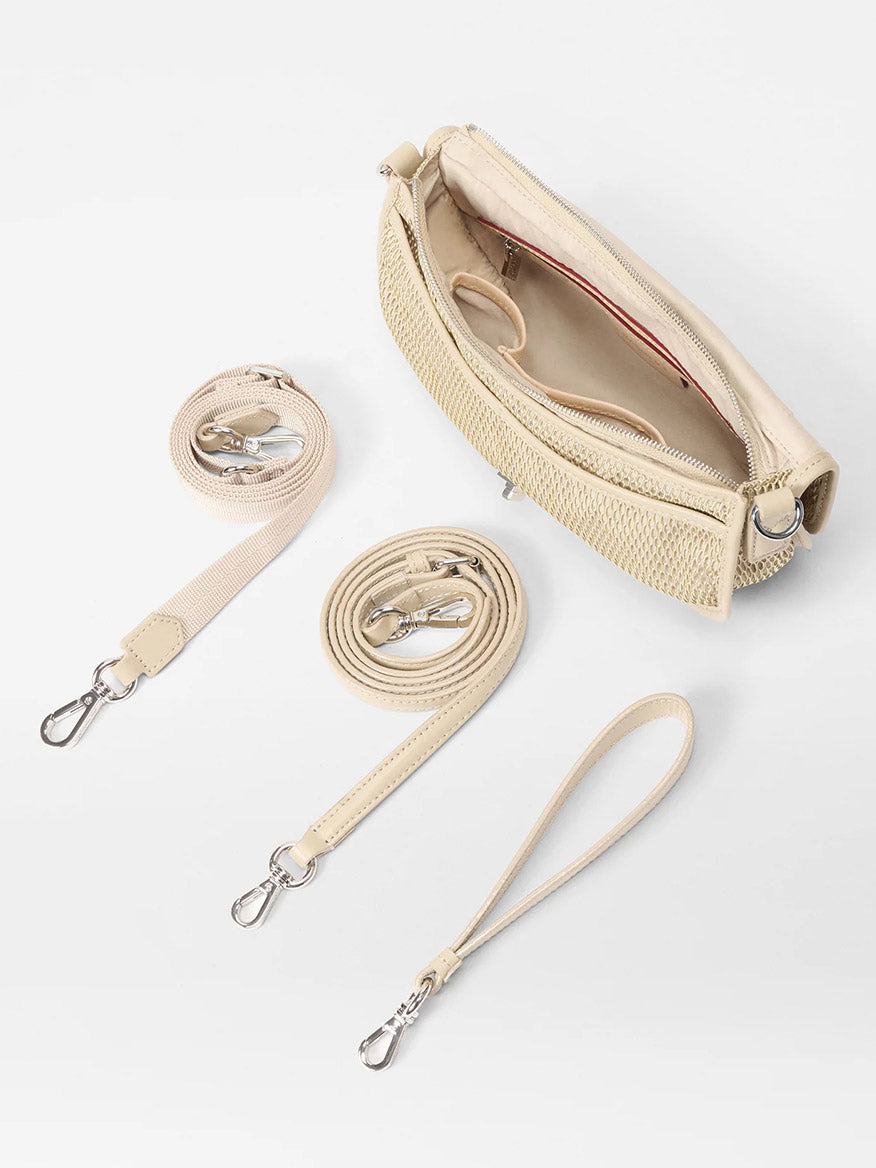 The MZ Wallace Small Astor Convertible Clutch in Buff Mesh features a beige textured mesh exterior, open-zipper interior view, Italian leather trim, and comes with three detachable straps including an adjustable option.
