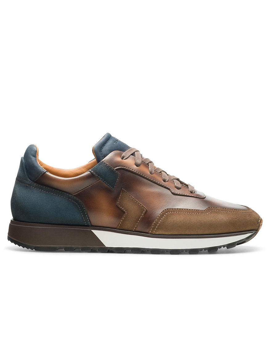 A men's brown and blue Magnanni Aero in Navy/Brown sneaker from the retro runner collection, crafted in leather.