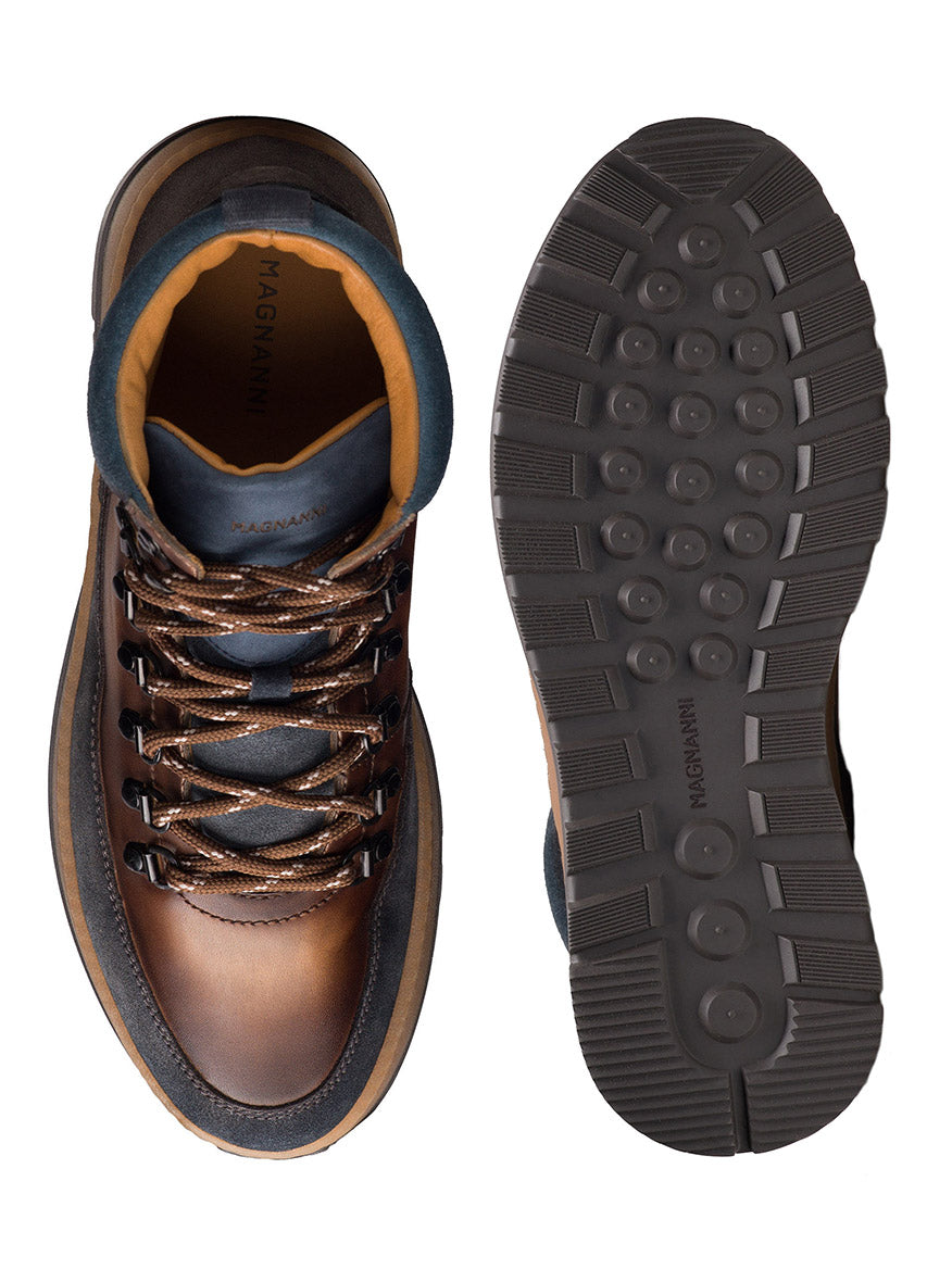 Top and bottom view of the Magnanni Borazo in Indigo/Brown, featuring brown leather with indigo accents, black laces, and a textured rubber sole—ideal for urban adventures and rugged functionality.