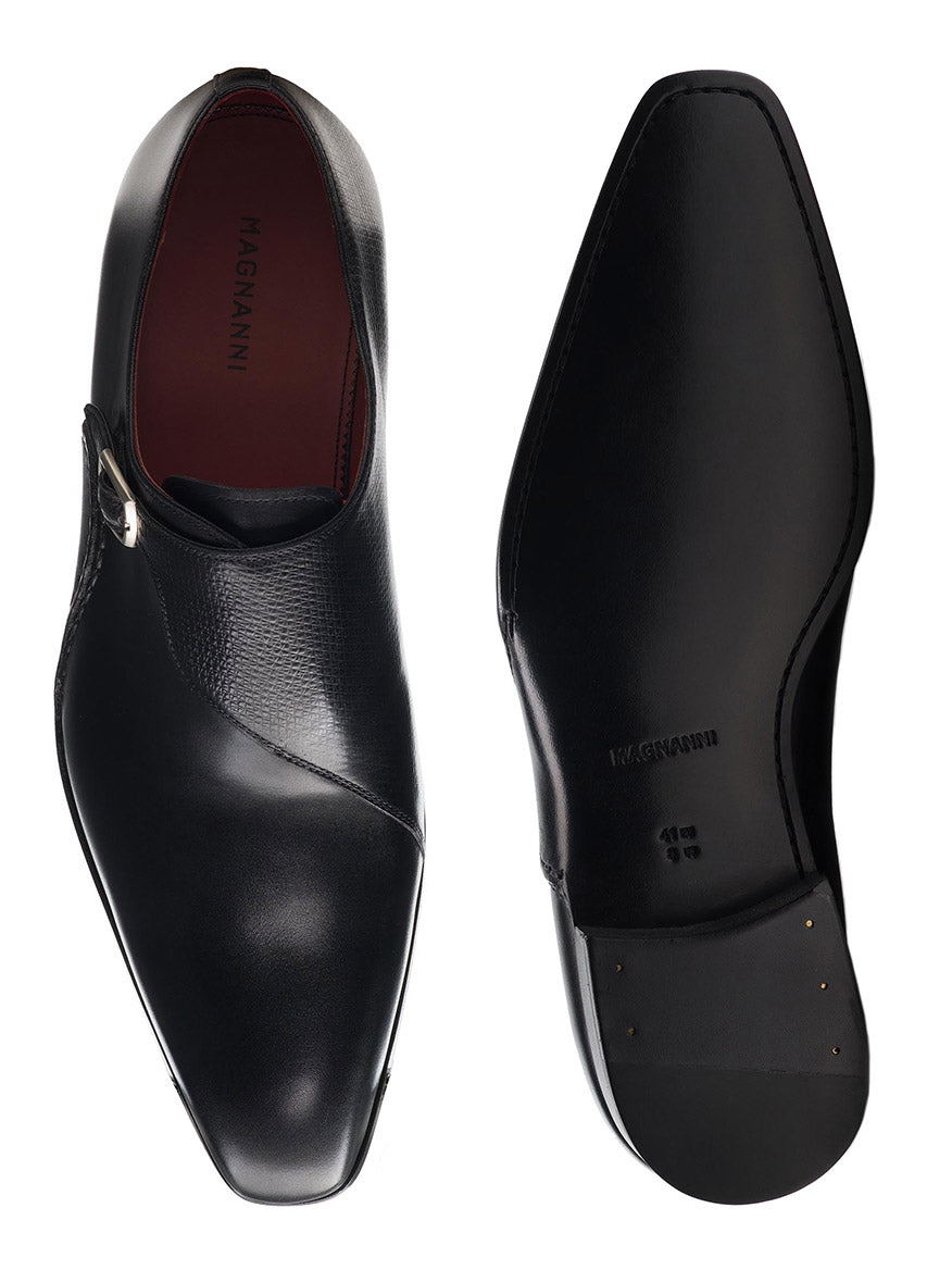 The Magnanni Carver in Black leather dress shoes features pointed toes, an elegant Artesano sole, and showcases exceptional craftsmanship from top and bottom views.