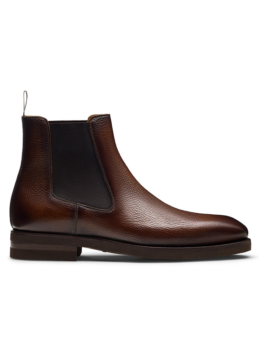 Magnanni Lonny in Tumbled Tabaco: a men's Chelsea boot in brown full-grain leather with elastic side panel, pull tab at the heel, and low stacked heel, shown in profile against a white background.