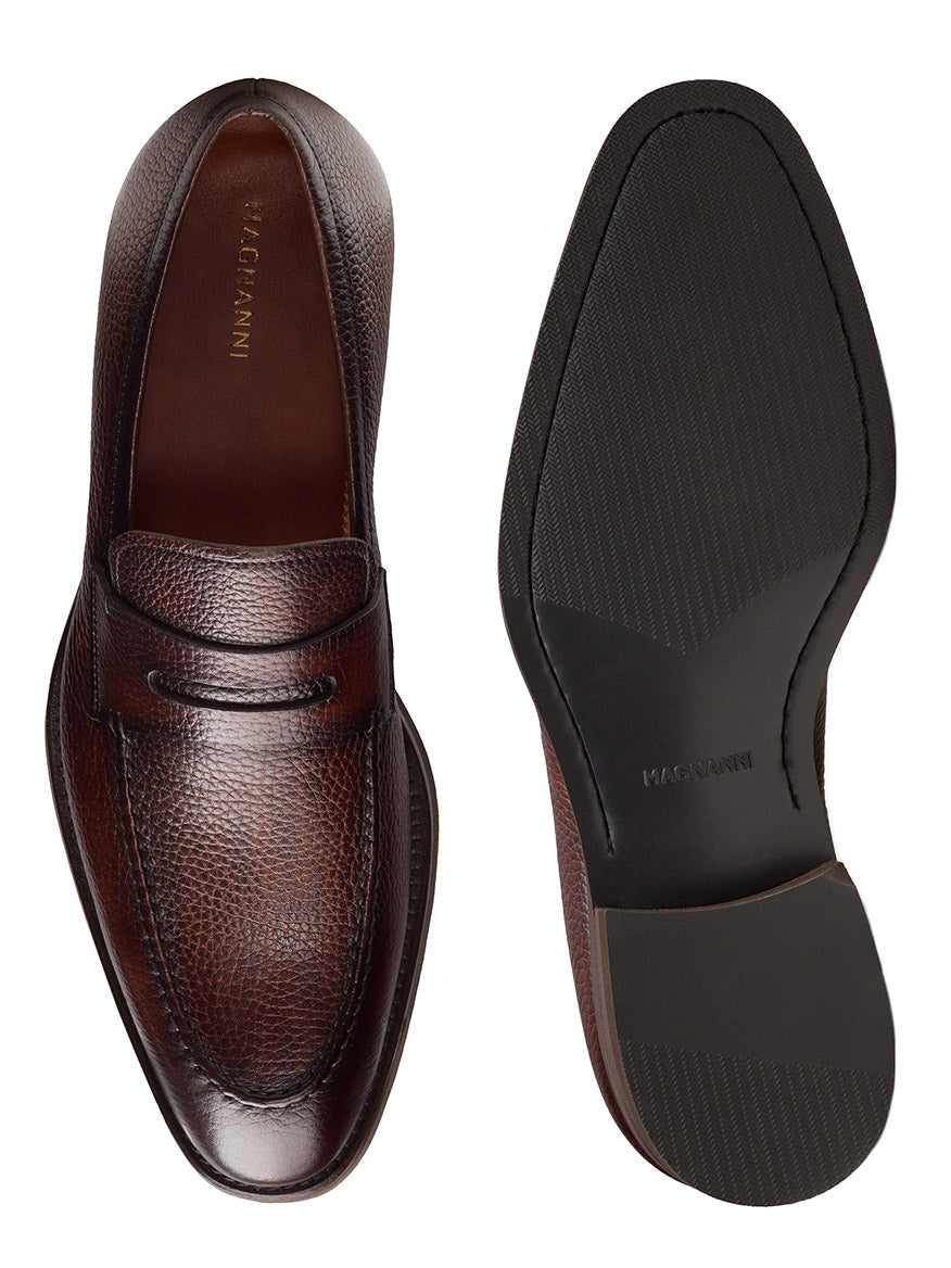 The Magnanni Matlin V in Tumbled Midbrown is pictured from the top and sole, highlighting textured brown leather and dark rubber outsoles—ideal for smart-casual men’s style.
