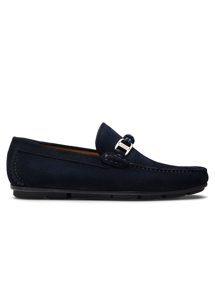 The Magnanni Monterey Braid Bit in Navy Suede is a dark blue slip-on driving loafer with a decorative metal buckle, stitched sole, and low-profile heel, displayed on a white background.