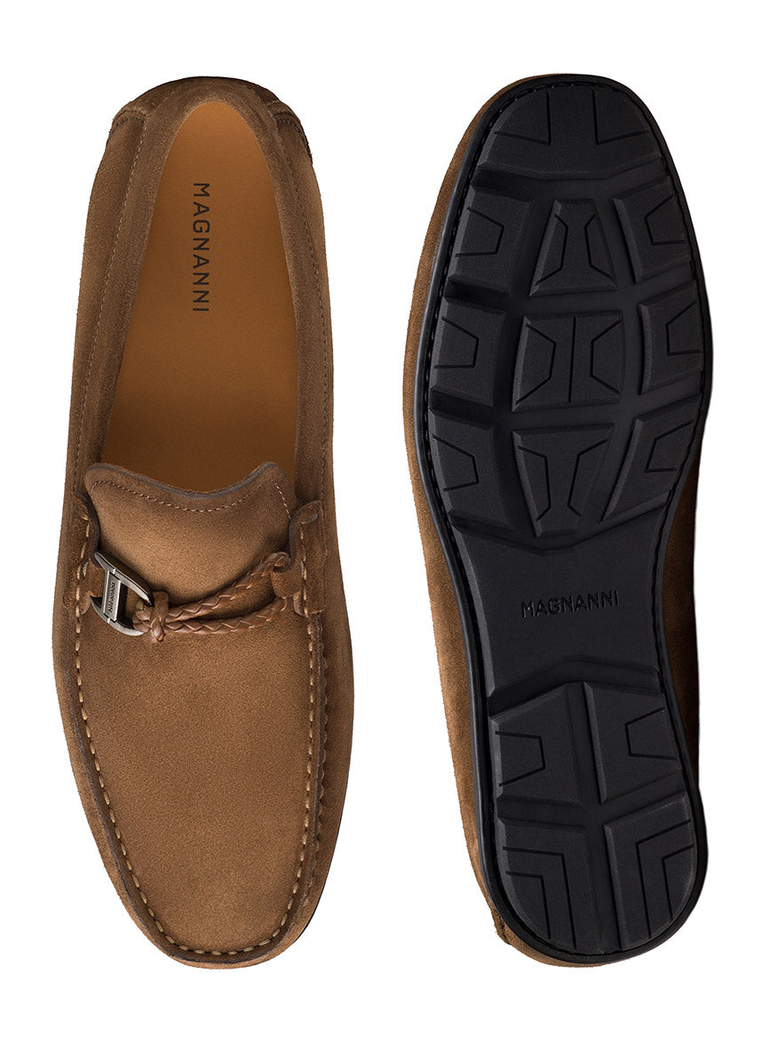 The Magnanni Monterey Braid Bit loafers in taupe suede feature a silver buckle, black rubber soles, and are beautifully displayed from top and bottom views. The leather lining adds luxurious comfort.