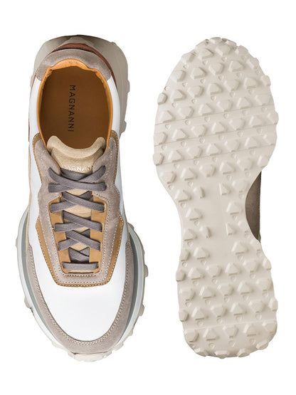 Sentence with product name: Top and bottom views of the Magnanni Onyx in White/Taupe sneaker from the Tech Runner series, displaying its beige, brown, and gray colors, treaded sole and inner branding.