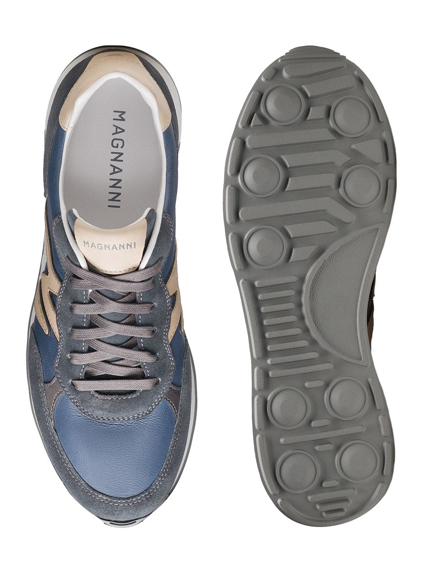 Top and bottom view of Magnanni Yoki in Indigo Suede/Cream, showcasing a blue and beige palette with textured soles and inner branding, featuring an athletic style sole that enhances its timeless retro aesthetic.