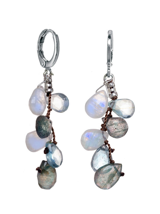 A pair of Margo Morrison Labradorite, Moonstone, & Aquamarine Earrings featuring an arrangement of translucent and semi-translucent moonstone beads on a silver metal hook.