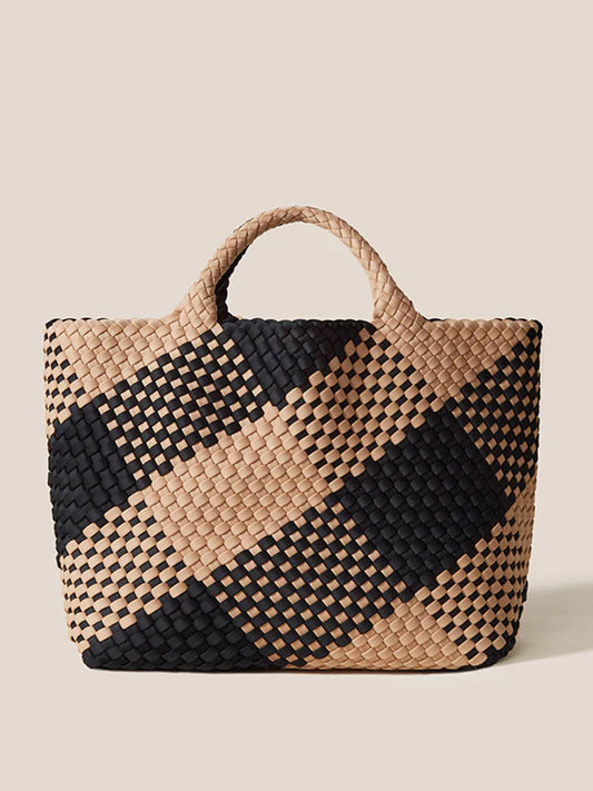 Handwoven Naghedi St. Barths Medium Tote in Plaid Cabana with black and natural beige diagonal stripes, displayed against a neutral background.