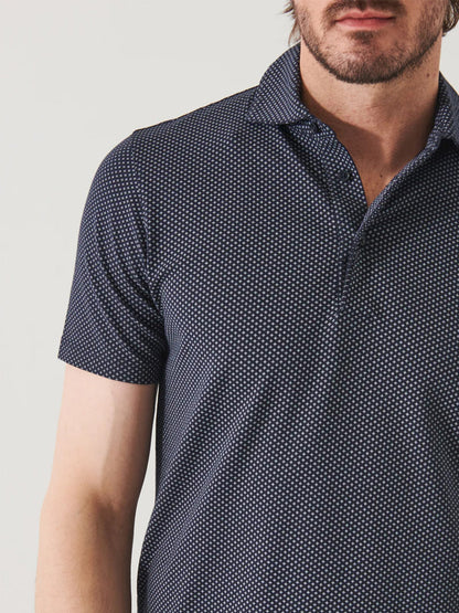 A man wearing a Patrick Assaraf Pima Cotton Stretch Printed Polo in Midnight Micro Star.