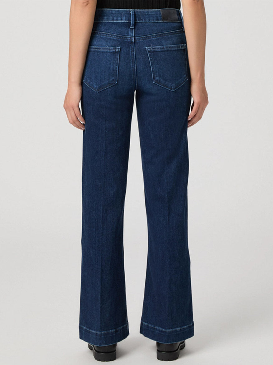 Model wears the Paige Leenah Petite Wide Leg Jean in Praline, shown from the back against a plain light background.