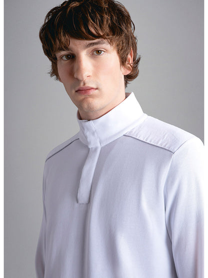 Young man with curly hair in a Paul & Shark Fresco Cotton Sweater With Linen Details in White, featuring a ribbed collar, against a neutral background.