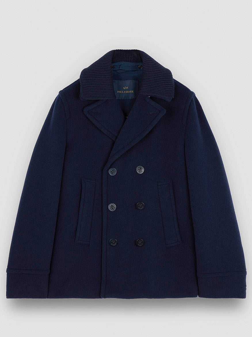 The Paul & Shark Peacoat in Wool & Cashmere in Navy features a double-breasted design, notched collar, front pockets, and four buttons per side, displayed against a plain light background.