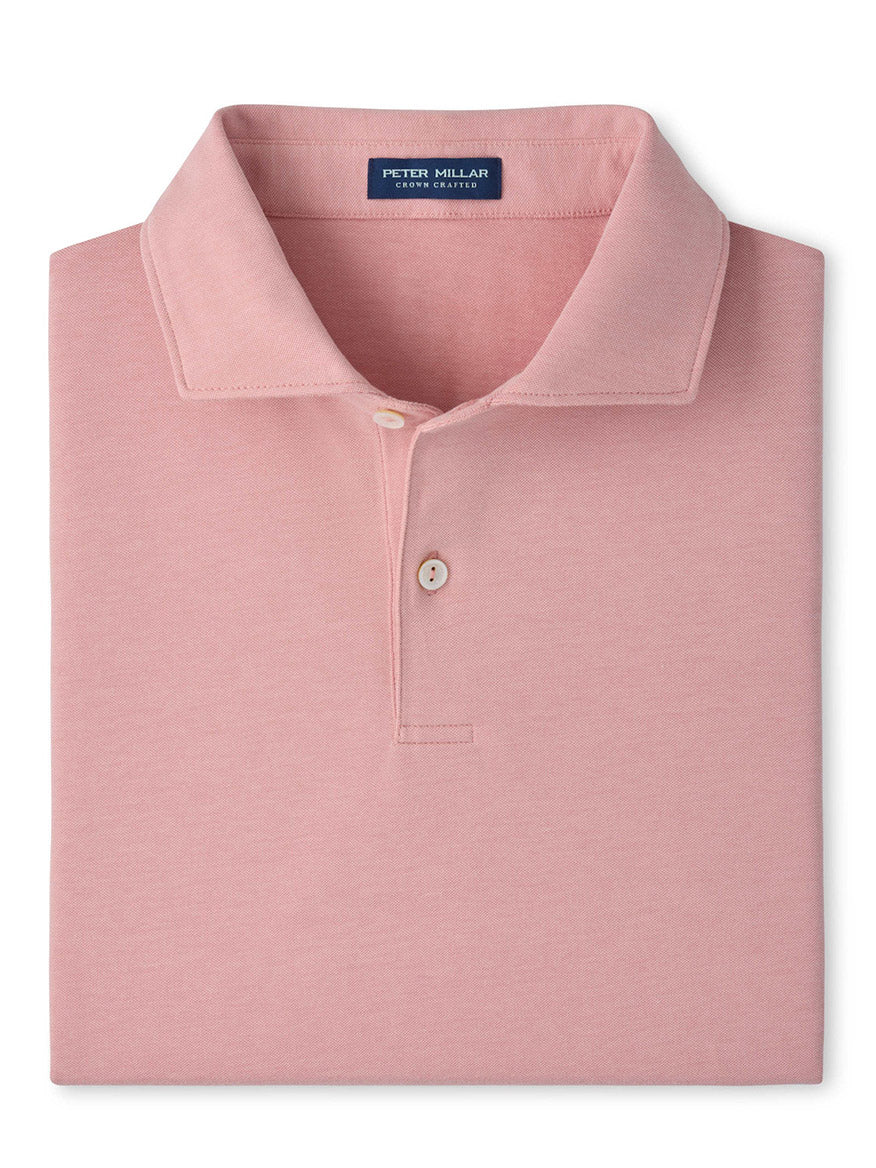 A Peter Millar Albatross Cotton-Blend Piqué Polo with an Edwin spread collar and two buttons, neatly folded, in Melrose Pink.