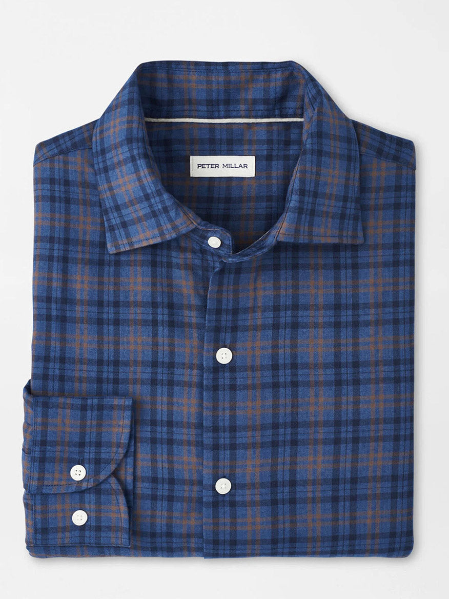 The Peter Millar Bar Harbor Performance Flannel Sport Shirt in Blue Haze is a soft, blue and brown plaid long-sleeve with white buttons—ideal for fall comfort and style.
