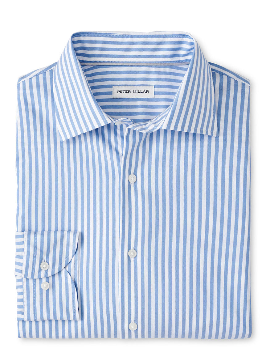 The Peter Millar Cannon Crown Lite Cotton-Stretch Sport Shirt in Evening Tide features blue and white vertical stripes, long sleeves, a button-up front, and easy-care fabric for effortless everyday wear.