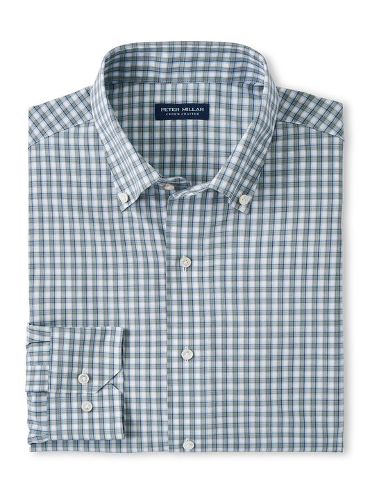A neatly folded Peter Millar Cole Performance Poplin Sport Shirt Sage Fog with the collar open, displaying a visible brand tag that reads "Peter Millar.