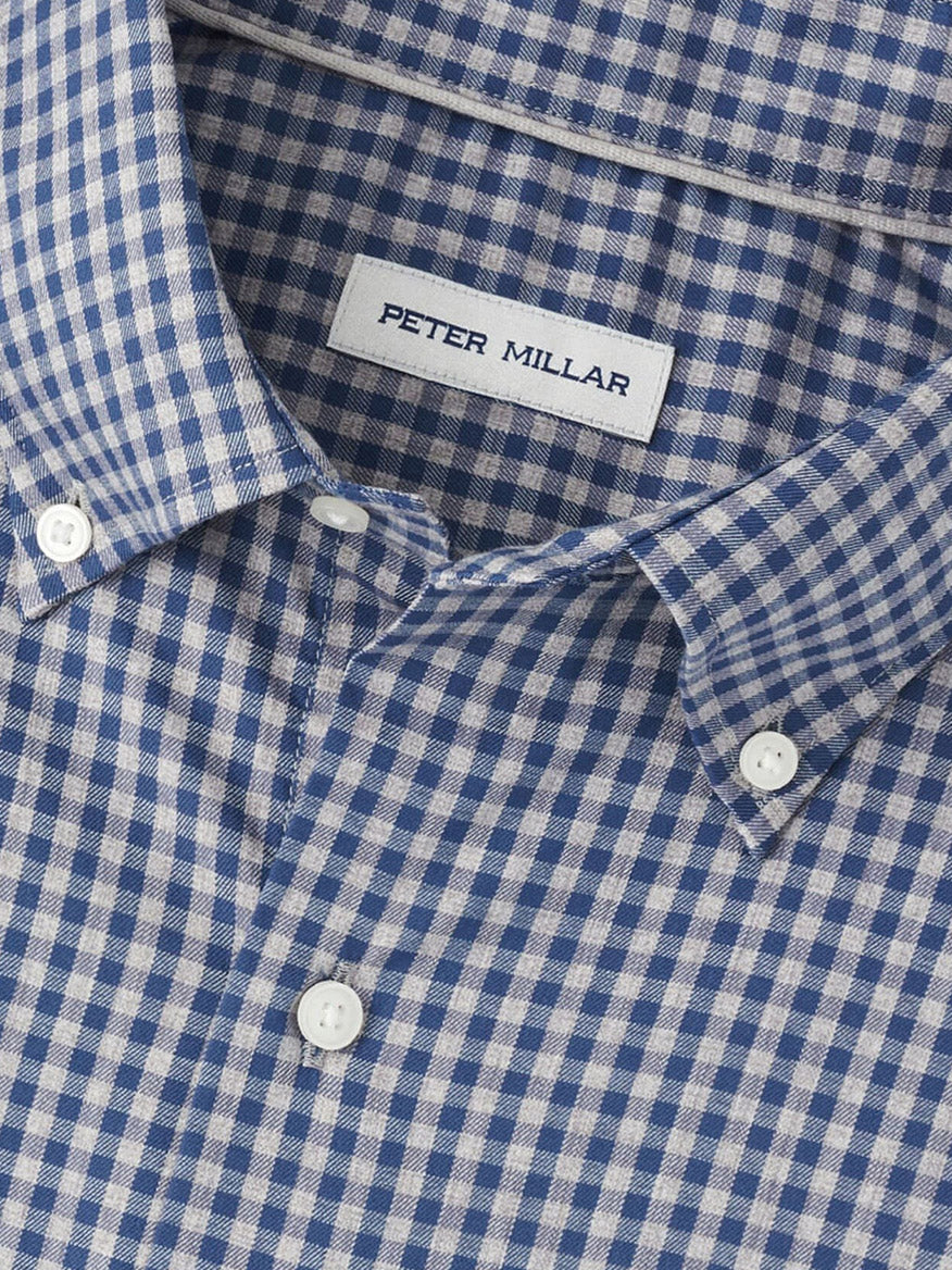Close-up of a Peter Millar Conway Crown Lite Cotton-Stretch Sport Shirt in Gale Grey, featuring a visible label inside the collar and crafted in easy-care cotton-stretch fabric for a classic fit.