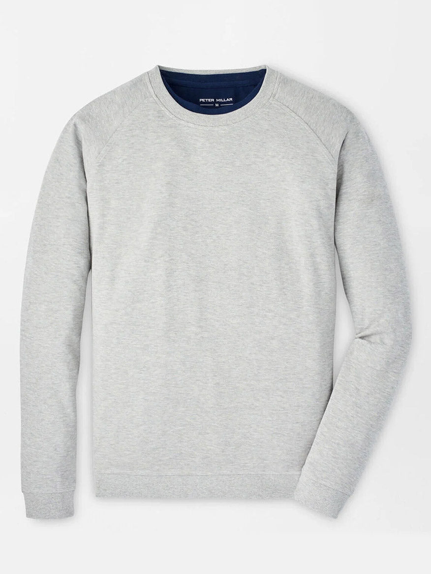 The Peter Millar Crown Comfort Knit Crew in Light Grey features a classic crewneck and long sleeves, laid flat on a white background—an essential, versatile addition to any wardrobe.
