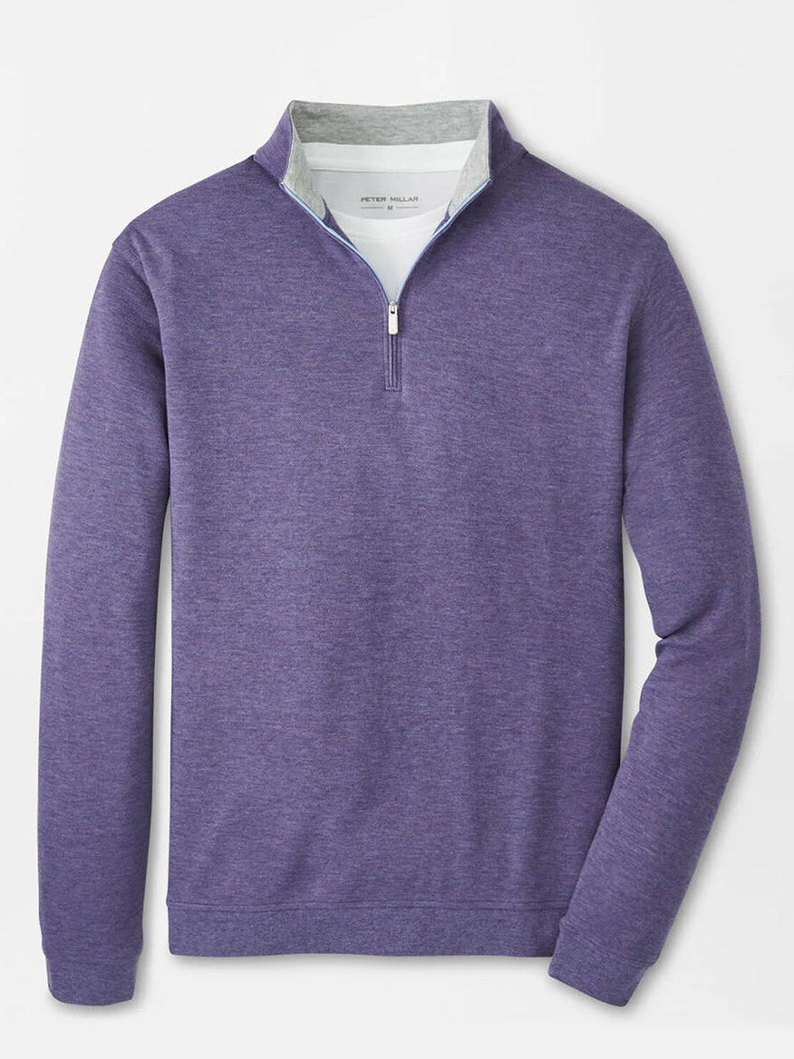 The Peter Millar Crown Comfort Pullover in Deep Violet is a long-sleeve, quarter-zip with four-way stretch, a stand collar, and white inner lining, displayed on a plain background.