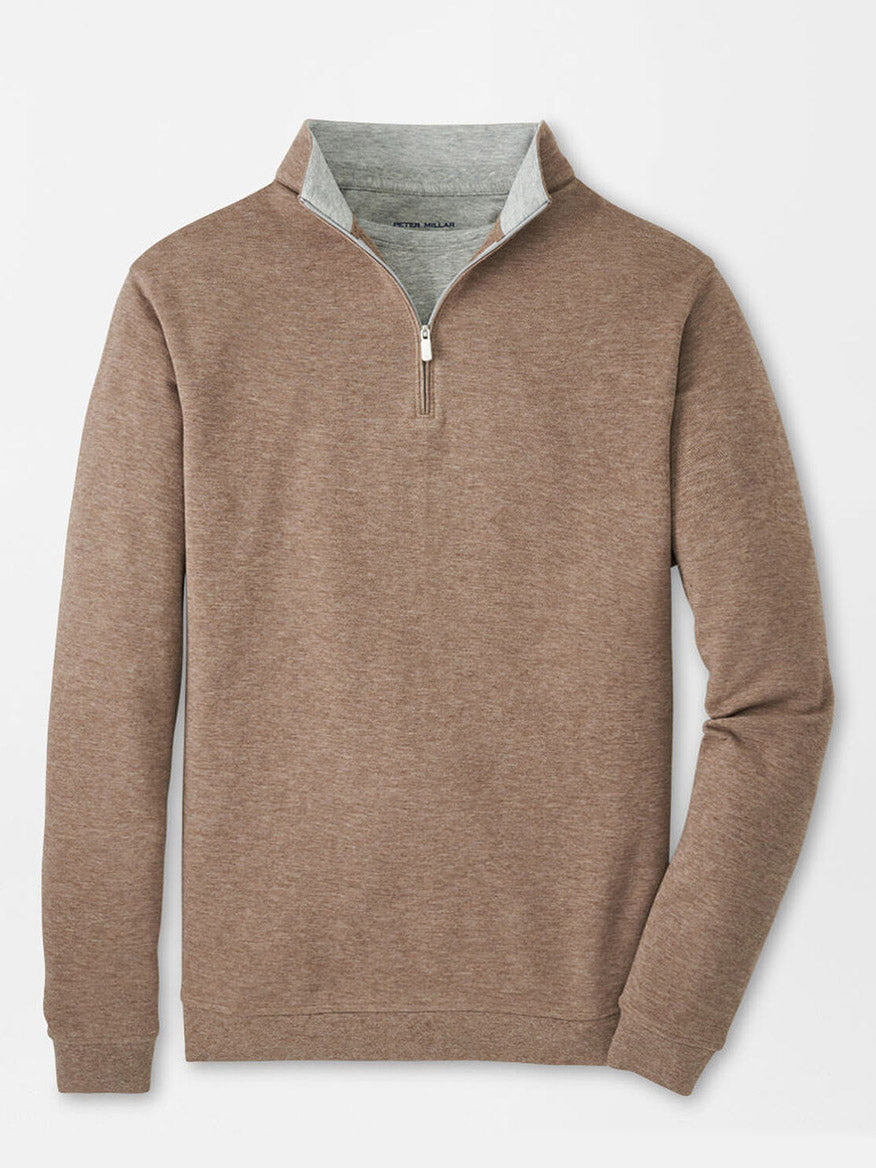 Peter Millar Crown Comfort Pullover in Poplar Brown: a light brown quarter-zip sweater with four-way stretch, standing collar, and contrasting light gray inner lining, displayed on a white background.