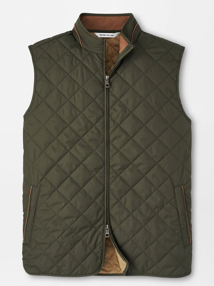 The Peter Millar Essex Vest in Dark Olive is a quilted, windproof vest featuring a front zipper, two side pockets with brown trim, and a standing collar.