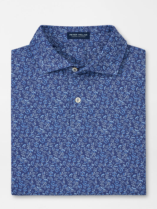Folded Peter Millar Fields of Carlsbad Performance Jersey Polo in Blue Pearl displayed on a plain background.