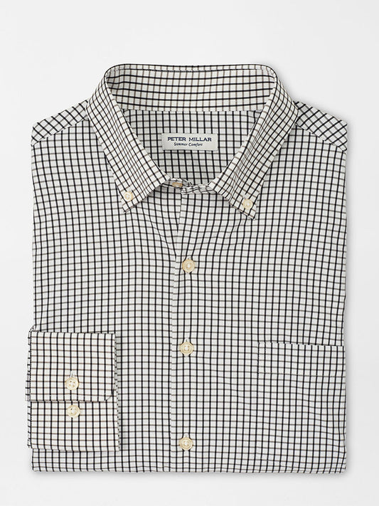 Folded Peter Millar Hanford Performance Twill Sport Shirt in Cottage Blue with a black and white checkered pattern, made from moisture-wicking performance fabric.