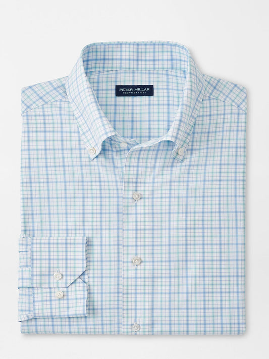 A tailored_fit folded Peter Millar Rollins Performance Poplin Sport Shirt in Iced Aqua with a collar.