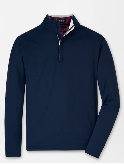 Navy blue long-sleeved Peter Millar Stealth performance quarter-zip pullover with patterned inner collar detail.