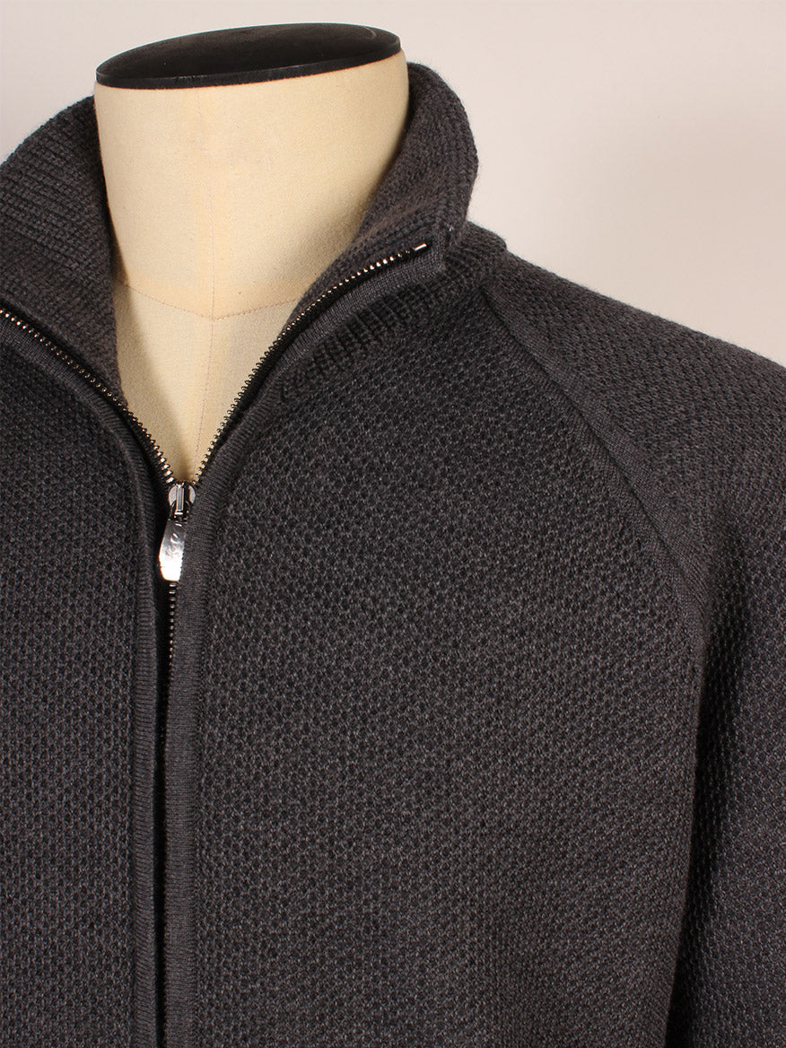 Close-up of a mannequin wearing the Piacenza 1733 Birdseye Zip Bomber in Charcoal, featuring textured knit fabric, raglan sleeves, and a standing collar.