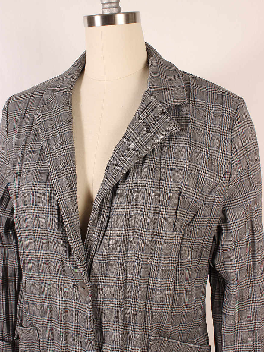 Porto Esquire Jacket in Ivory Plaid from the Pelican Pleat collection on a mannequin.
