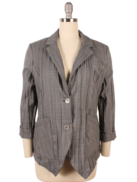 A packable plaid blazer from the Porto Esquire Jacket in Ivory Plaid collection on a mannequin.