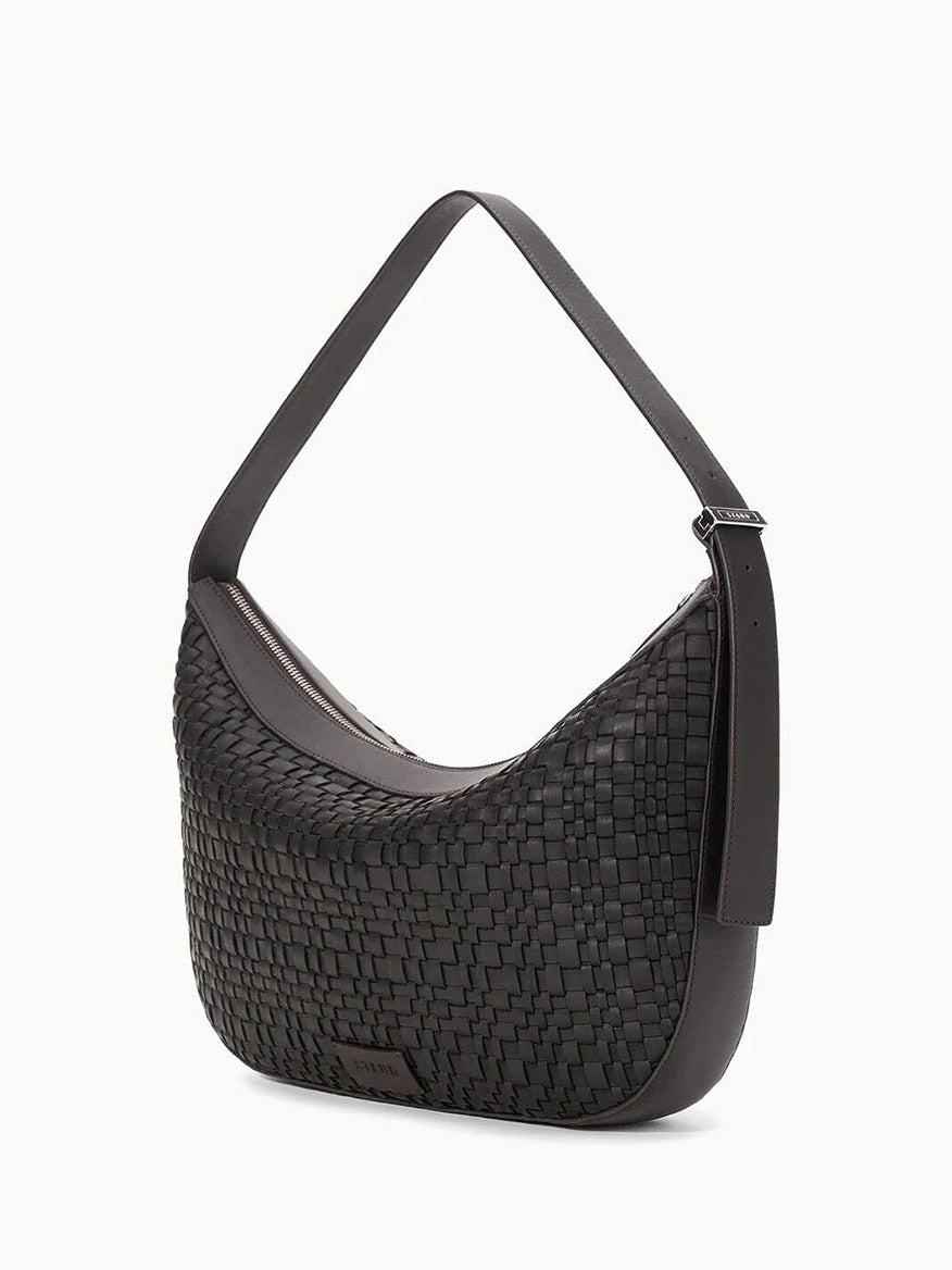The STAUD Large Demy Shoulder Bag in Espresso features black woven leather and a single adjustable-length shoulder strap, shown against a plain white background.