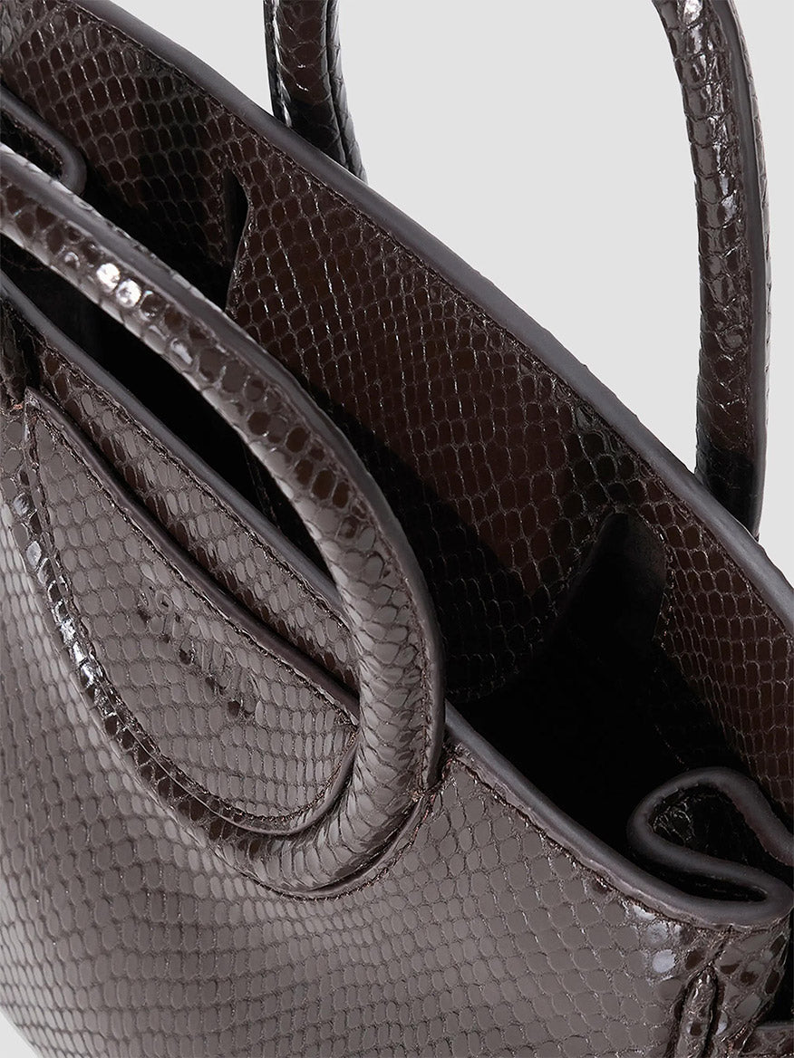 STAUD Maude Mini Carryall in Espresso Snake, a dark brown mini bag with a snake-embossed leather texture and dual top handles.
