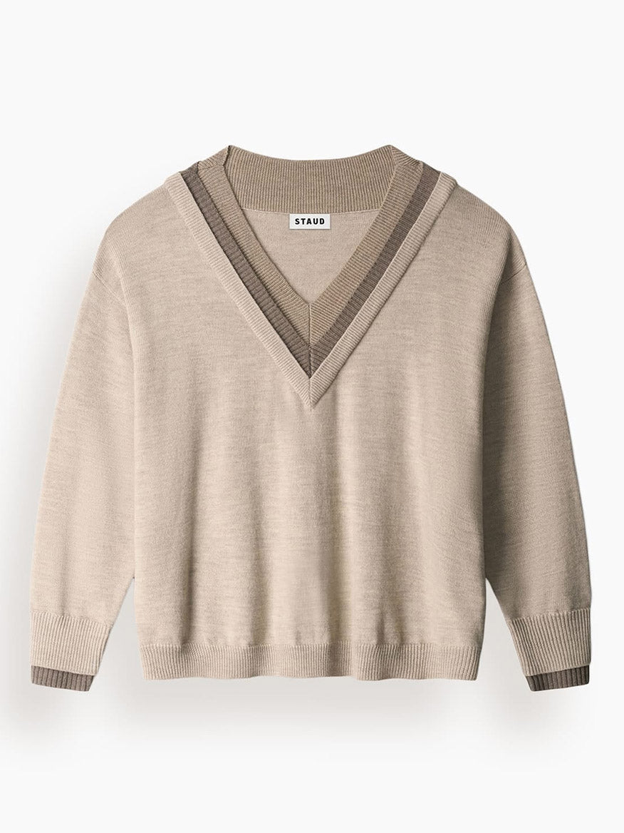 STAUD Norman Sweater in Sesame Multi: an oversized beige knit sweater featuring a V-neck with a triple-layer neckline and brown striped trim at the cuffs.