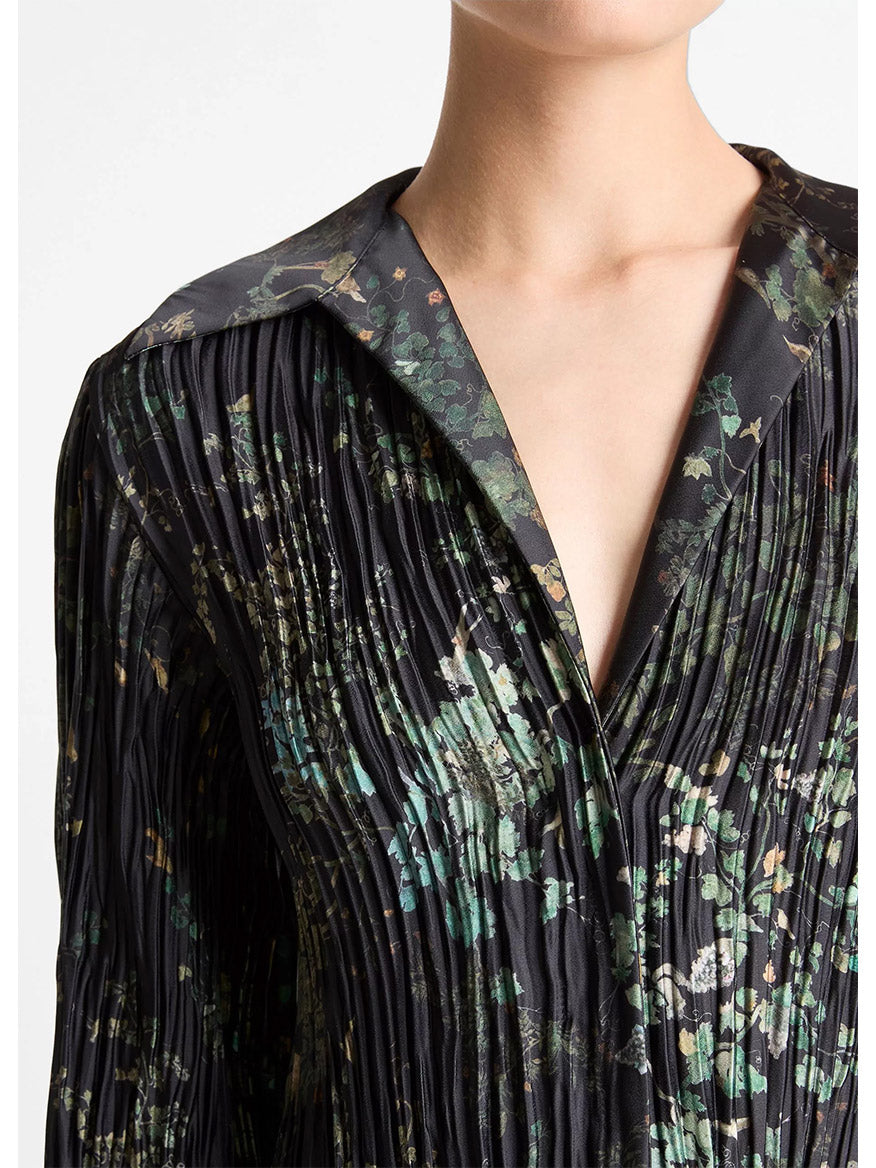 A person wears the Vince Grape Vine Crushed Satin Shirt Dress in Black Sky; only their upper torso is visible.