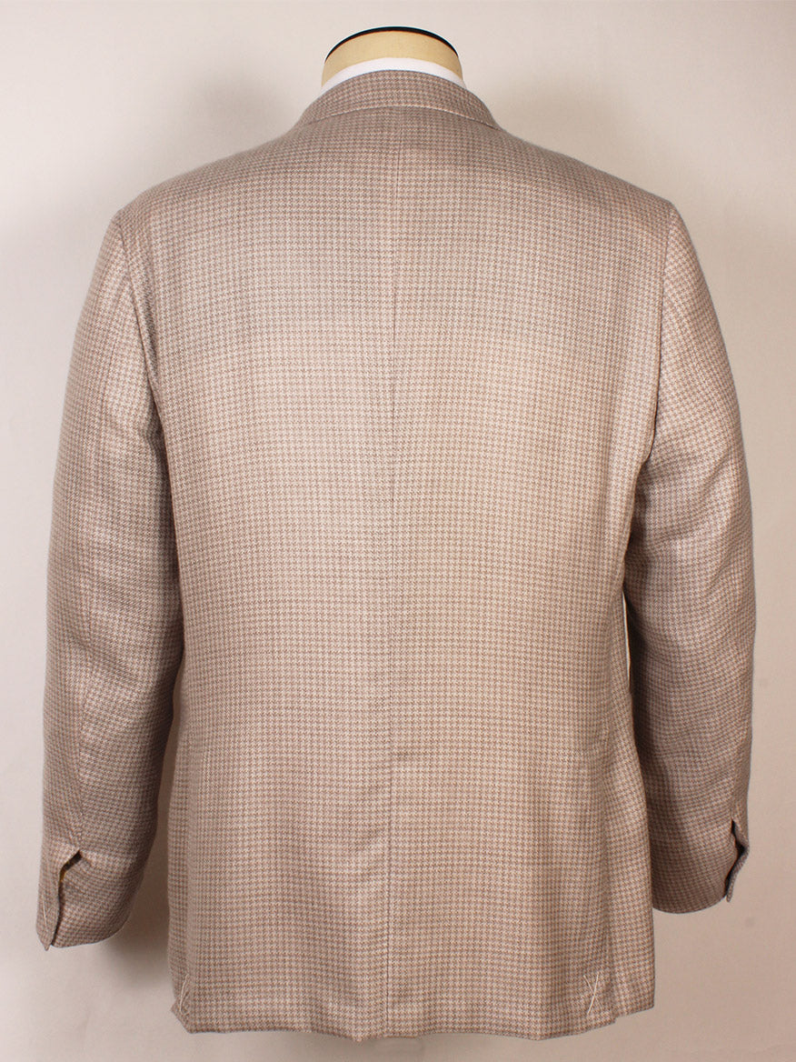 The Zegna Cream Houndstooth Cashmere Blend Sport Jacket, displayed from the back on a mannequin, features visible sleeve buttons, a center seam, and elegant notch lapels.
