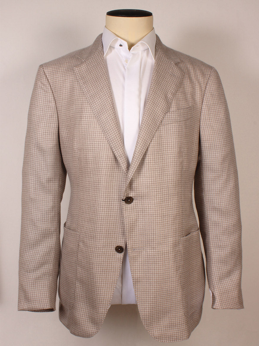 The Zegna Cream Houndstooth Cashmere Blend Sport Jacket, made in Italy, features notch lapels, two brown buttons, patch pockets, and is shown with a white dress shirt on a mannequin.