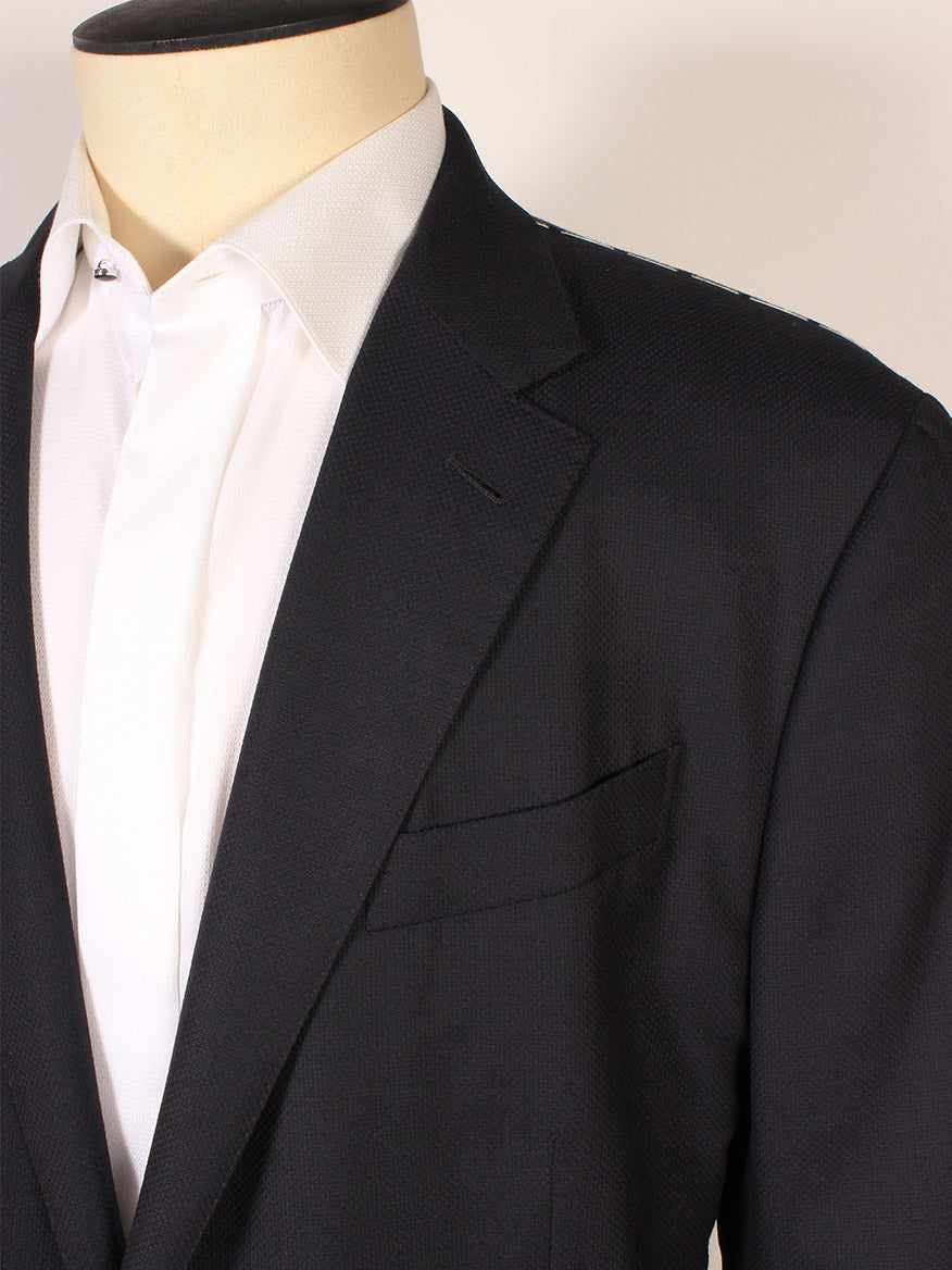 A close-up of a headless mannequin dressed in a white dress shirt and the Zegna Navy Trofeo Comfort Wool Blazer with notch lapels.