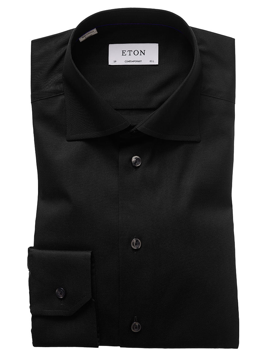 A neatly folded Eton Contemporary Fit Black Signature Twill Dress Shirt with a tag indicating the brand name Eton and the size 37 contemporary fit. This wrinkle-free shirt features a classic collar and buttons down the front and on the cuffs.